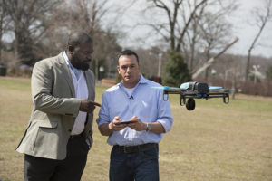 Lanier A. Watkins, left, a Johns Hopkins cyber security research scientist, worked with five graduate students, including Michael Hooper, at right, to determine that the technology used in a hobby drone was vulnerable to hacking. Photo by Will Kirk/Johns Hopkins University. 